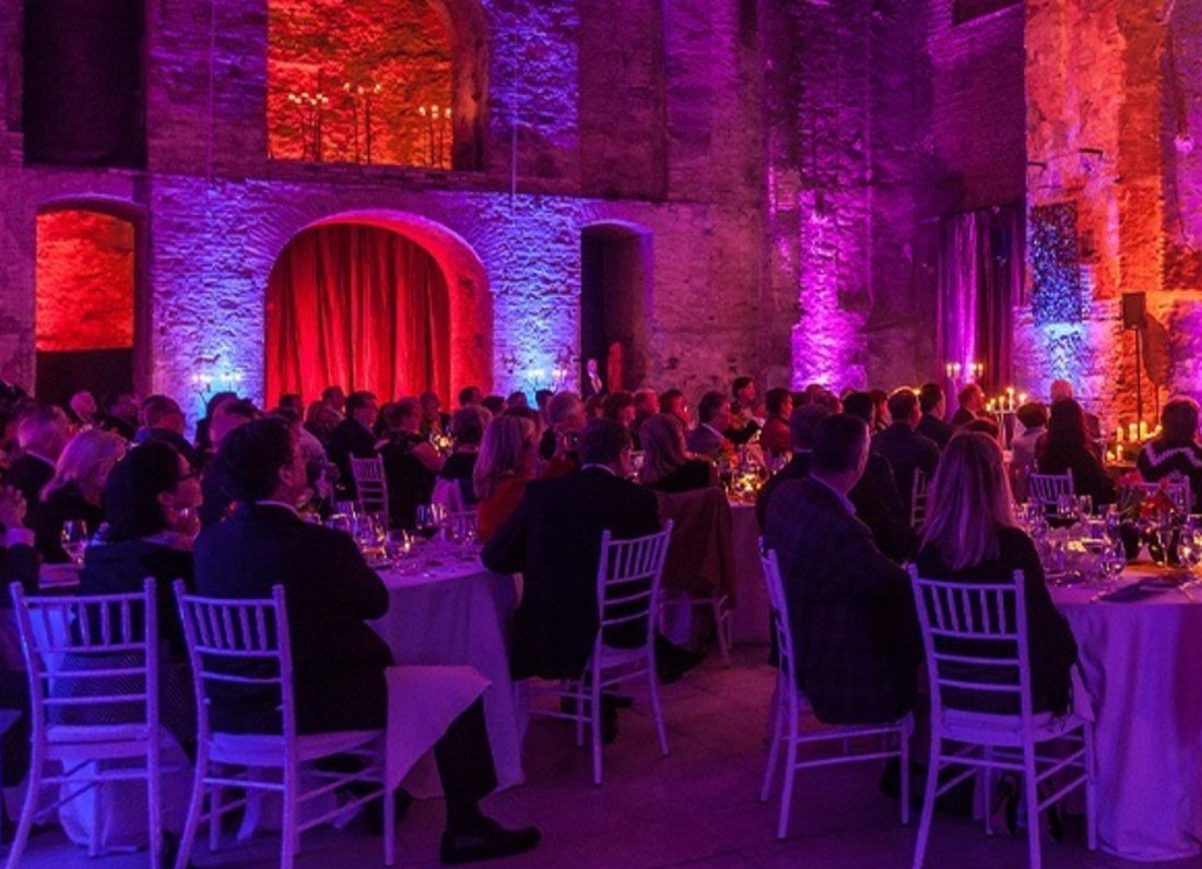 Awards gala dinner in a historic illuminated venue
